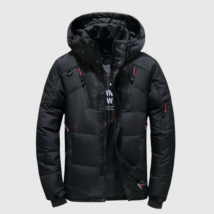 André – Prošívaná bunda s kapucí a technickými detaily